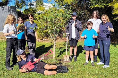 Pacific Hope students helping to plant trees